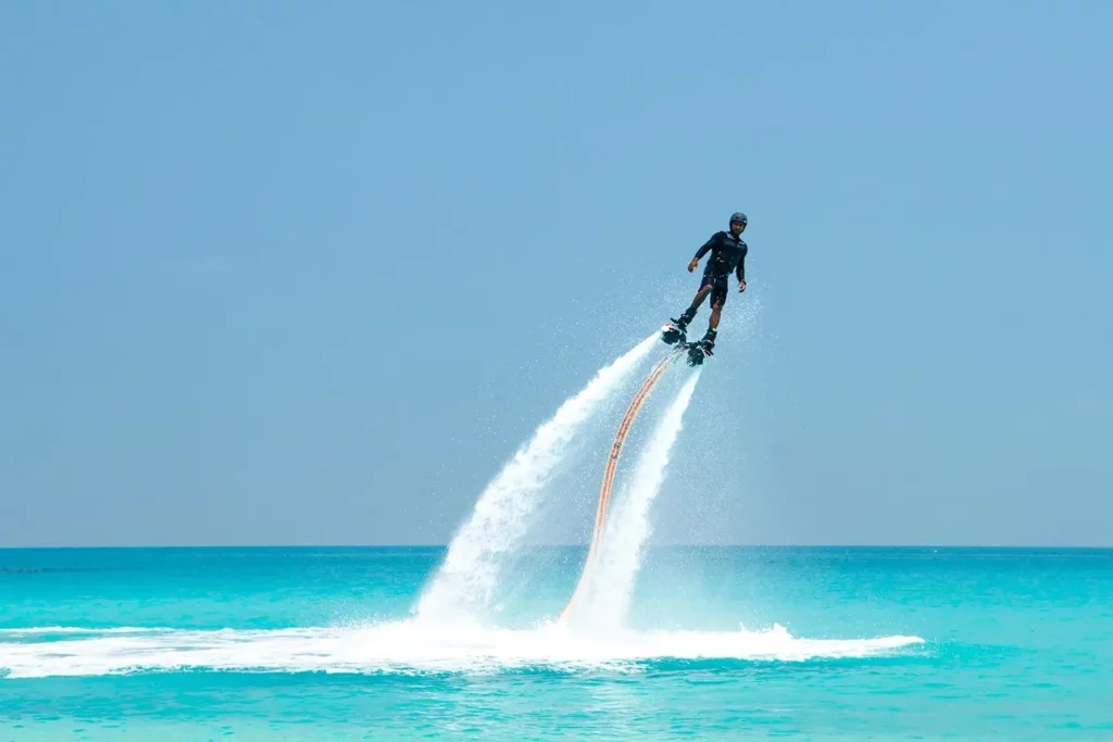man riding X-Jet Blade in turquoise water